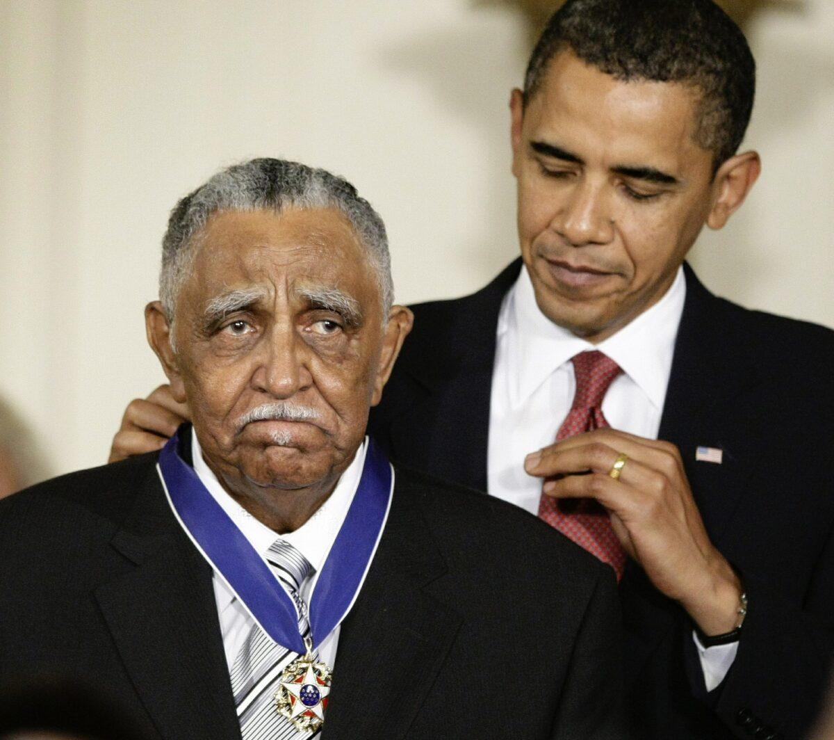 Former President Barack Obama presents the 2009 Presidential Medal of Freedom to the Rev. Joseph E. Lowery n the East Room of the the White House in Washington on Aug. 12, 2009. (J. Scott Applewhite/AP Photo)