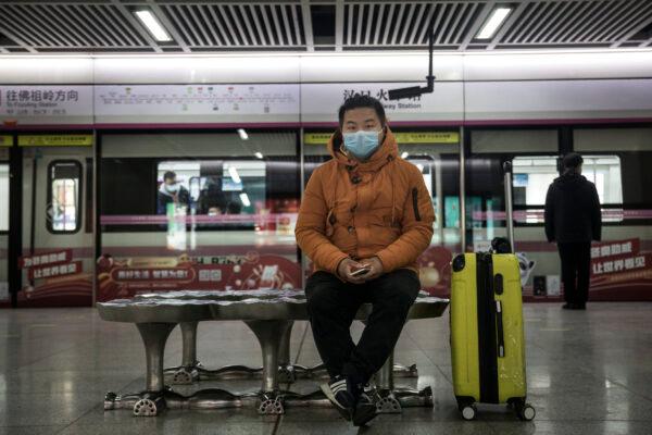 A passenger waits for the train in Wuhan Metro, Hubei Province, China, on March 28, 2020. (Getty Images)