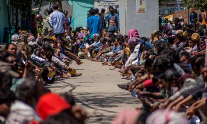 Social Workers in India’s Capital Raise Concerns as COVID-19 Shutdown Sparks Massive Exodus