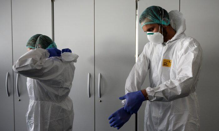 Italy Reports 837 Virus Fatalities, Health Official Says Its at the ‘Plateau’