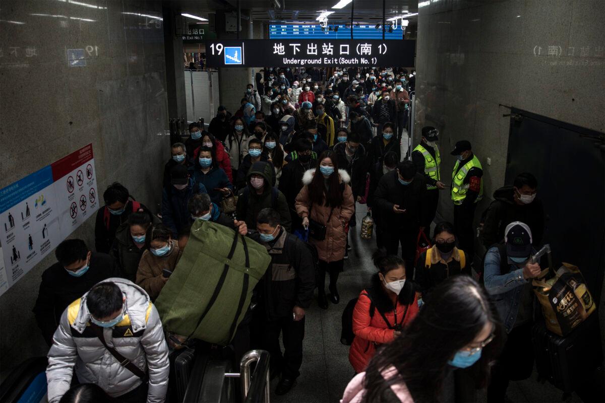 Passengers arrive in Hankou Railway Station in Wuhan, China, on March 28, 2020. (Getty Images)
