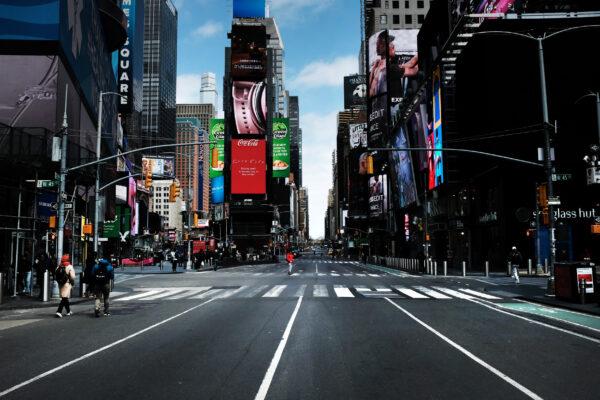  Times Square stands mostly empty as much of the city is void of cars and pedestrians over fears of spreading the CCP virus in New York City on March 22, 2020. (Spencer Platt/Getty Images)
