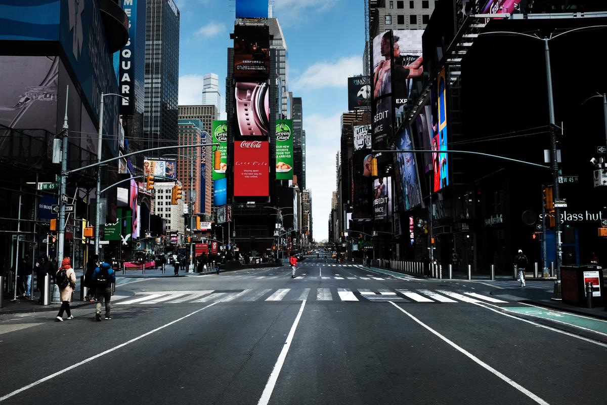 Times Square stands mostly empty as much of the city is void of cars and pedestrians over fears of spreading the CCP virus in New York City on March 22, 2020. (Spencer Platt/Getty Images)