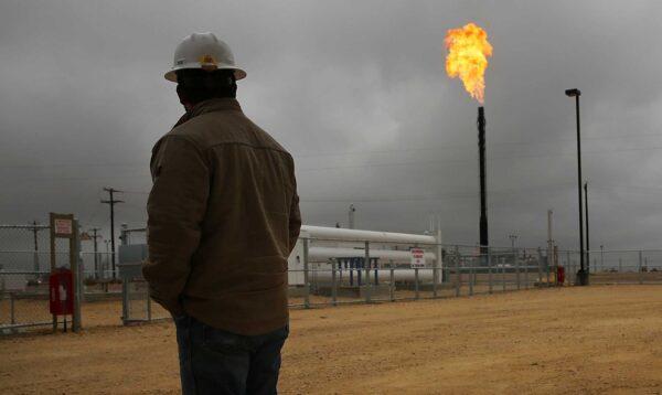 Flared natural gas is burned off at Apache Corporation's operations at the Deadwood natural gas plant in the Permian Basin in Garden City, Texas, on Feb. 5, 2015. (Spencer Platt/Getty Images)