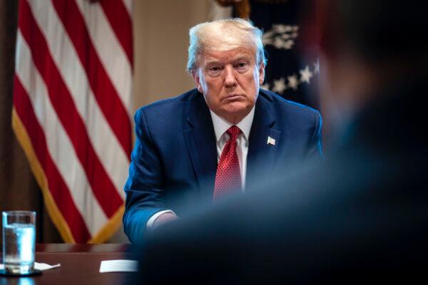 President Donald Trump meets with supply chain distributors in reference to the CCP virus pandemic, in the Cabinet Room in the West Wing at the White House on March 29, 2020. (Pete Marovich/Pool/Getty Images)