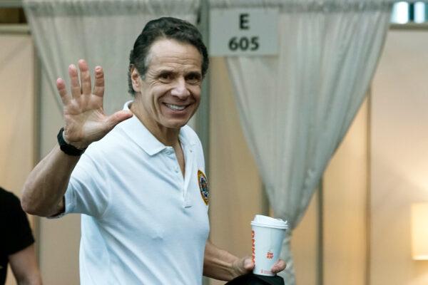 New York Gov. Andrew Cuomo waves after giving a daily CCP virus press conference at the Jacob K. Javits Convention Center, which is being turned into a hospital to help fight CCP virus cases in New York City on March 27, 2020. (Eduardo Munoz Alvarez/Getty Images)