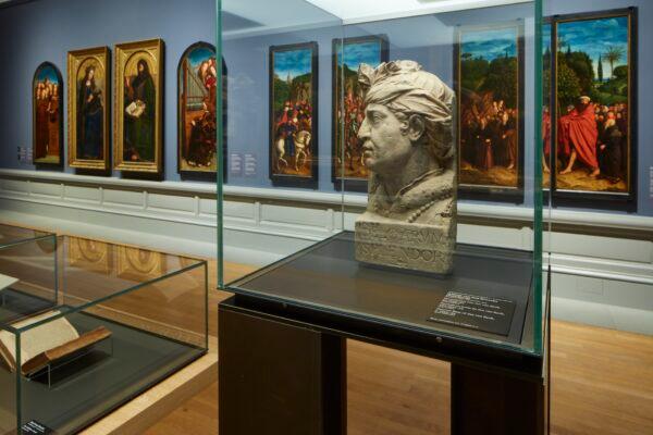 Panels from the van Eyck brothers’ Ghent Altarpiece are on display as individual artworks, in the exhibition “Van Eyck: An Optical Revolution” at the Museum of Fine Arts Ghent, in Belgium. In the foreground, a bust of Jan van Eyck looks out onto his art. (MSK Ghent/David Levene)