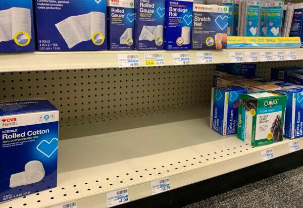 An empty shelf in a local pharmacy that used to be stocked with masks that are now sold out, as people scramble to protect against the spread of the coronavirus that causes COVID-19, in Los Angeles, Calif., on Jan. 22, 2020. (Mark Ralston/AFP via Getty Images)