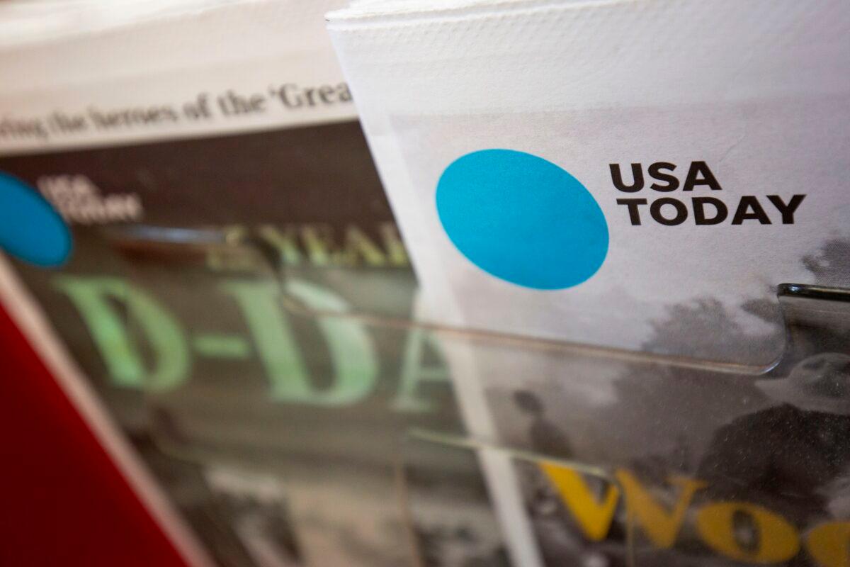 The front page of a USA Today newspaper is seen at a convenience store in Washington on Aug. 6, 2019. (Alastair Pike/AFP via Getty Images)