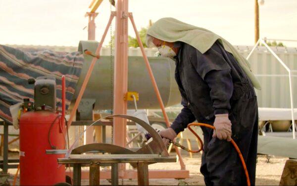 Mike Huges works on one of his rockets in 2018. (Toby Brusseau)