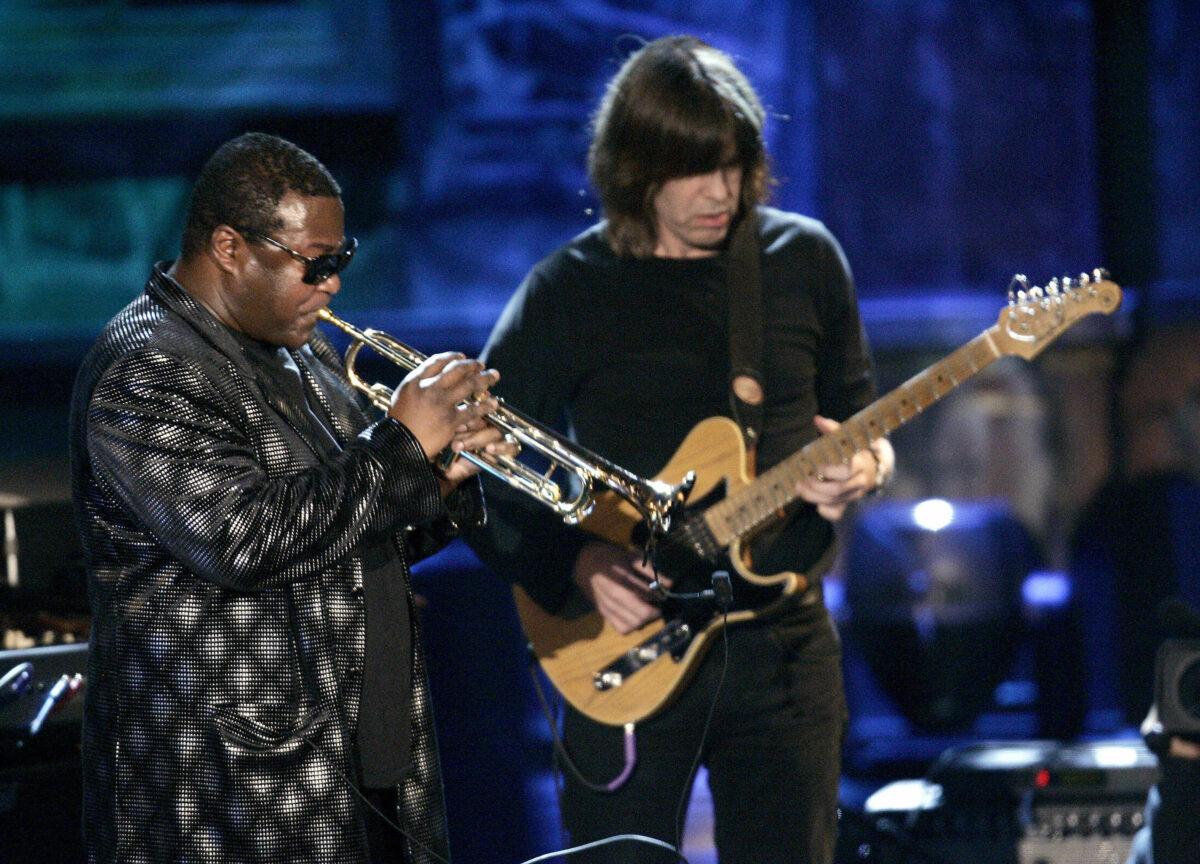 Trumpet player Wallace Roney and guitarist Mike Stern perform a medley of Miles Davis songs to honor the late inductee Miles Davis during the Rock and Roll Hall of Fame Induction Ceremony in New York on March 13, 2006. (Timothy A. Clary/AFP via Getty Images)