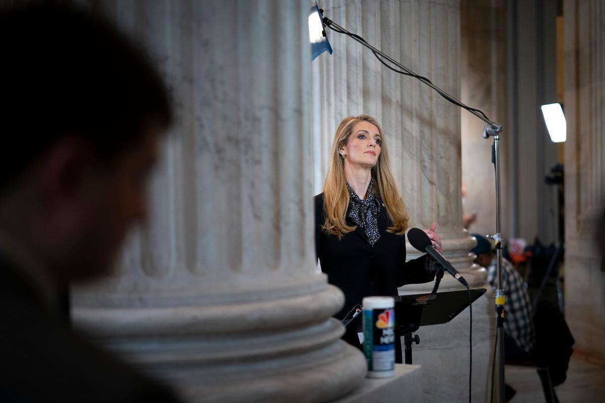 Sen. Kelly Loeffler (R-Ga.) does a television interview on Capitol Hill in Washington on March 20, 2020. (Drew Angerer/Getty Images)