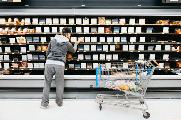 A person shops in front of empty shelves in the deli section of the Walmart Supercenter as concerns grow over the spread of the CCP virus in Nashville, Tenn., on March 14, 2020. (Jason Kempin/Getty Images)