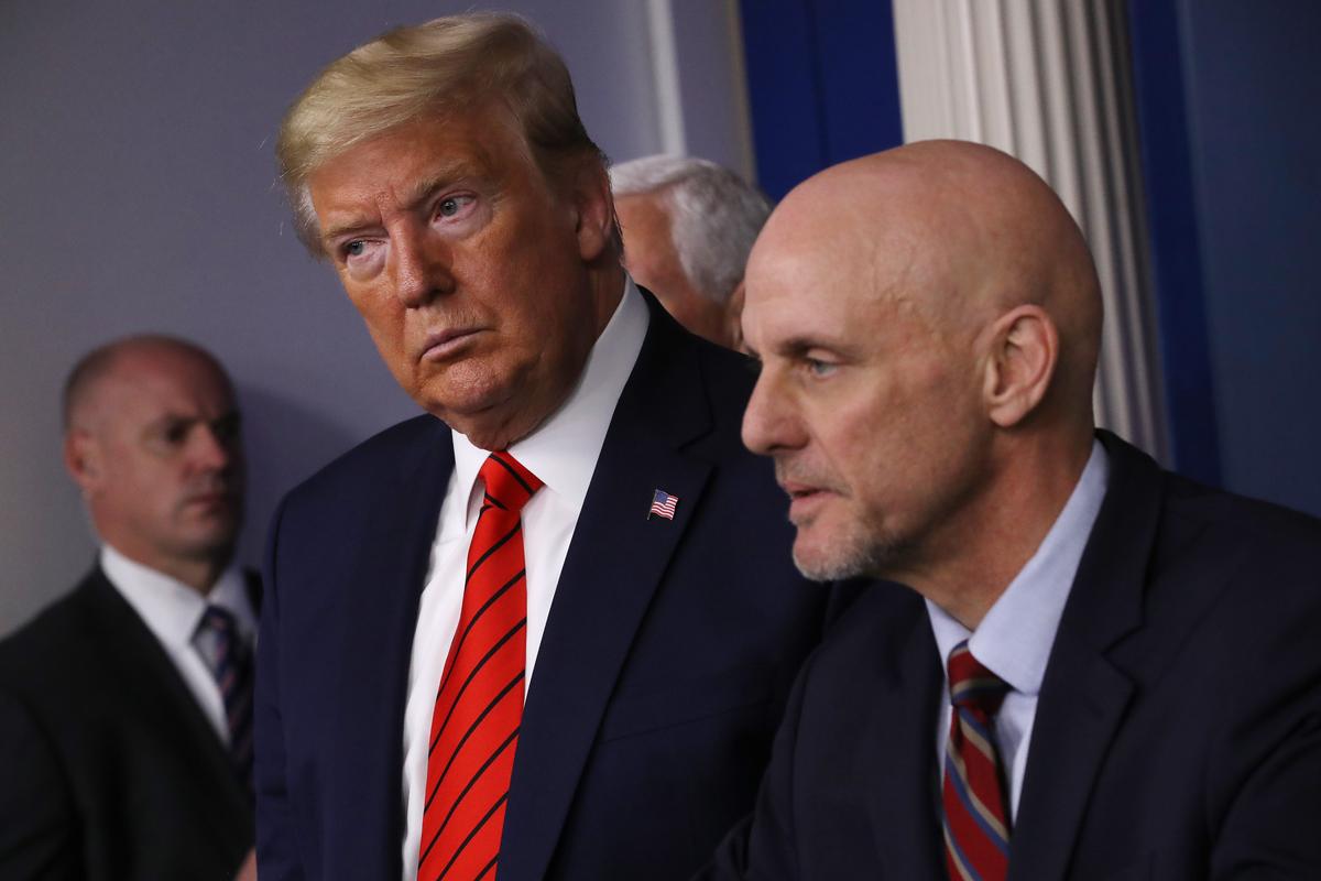 President Donald Trump listens to FDA Commissioner Stephen Hahn during a news conference with members of the White House Coronavirus Task Force in the Brady Press Briefing Room at the White House on March 19, 2019. (Chip Somodevilla/Getty Images)