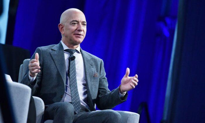 Bezos to Give Amazon Reins to Cloud Boss Jassy as Sales Rocket Past $100 Billion