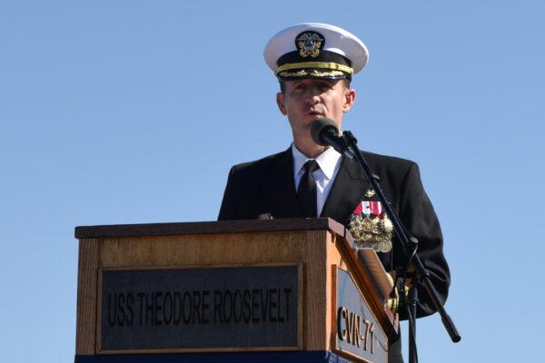 Capt. Brett Crozier addresses the crew for the first time as commanding officer of the aircraft carrier USS Theodore Roosevelt during a change of command ceremony on the ship’s flight deck in San Diego, on Nov. 1, 2019. (U.S. Navy/Mass Communication Specialist 3rd Class Sean Lynch/Handout via Reuters)