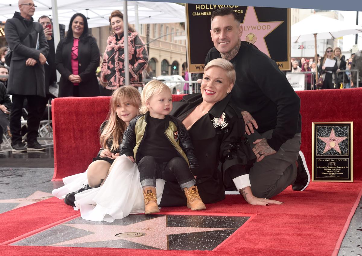 Pink with her husband, Carey Hart, and their children, Willow and Jameson, by Pink's star on The Hollywood Walk of Fame on Feb. 5, 2019 (©Getty Image | <a href="https://www.gettyimages.com/detail/news-photo/pink-poses-with-husband-carey-hart-and-children-willow-hart-news-photo/1127624944?adppopup=true">Alberto E. Rodriguez</a>)