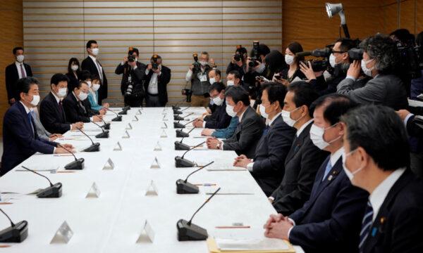 Japan's Prime Minister Shinzo Abe speaks during a meeting about the measures against the CCP virus, at the prime minister's official residence in Tokyo, Japan on April 6, 2020. (Franck Robichon/Pool via Reuters)