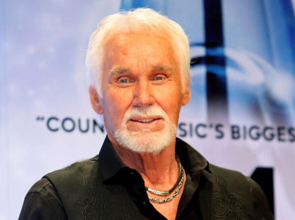 Kenny Rogers poses backstage after accepting the Willie Nelson Lifetime Achievement award at the 47th Country Music Association Awards in Nashville, Tenn., on Nov. 6, 2013.(Eric Henderson/Reuters)