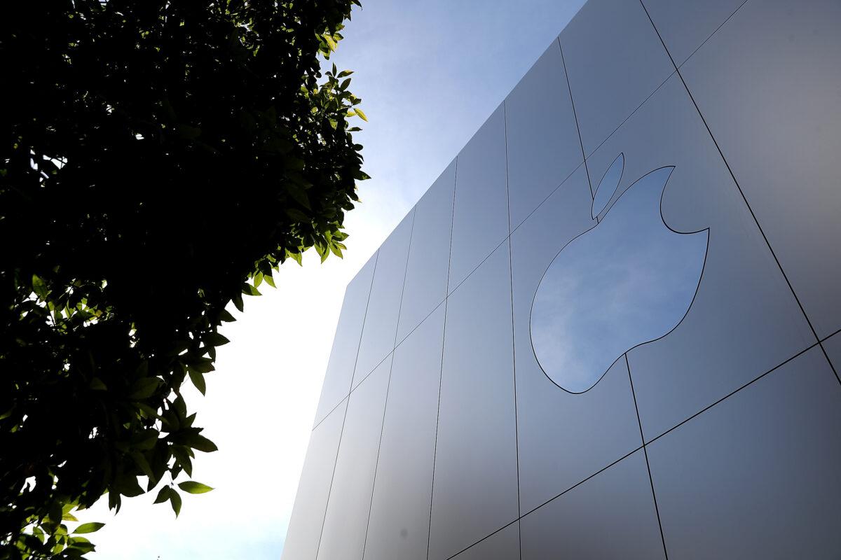 The Apple logo is displayed on the exterior of an Apple Store in San Francisco, Calif., on Feb. 1, 2018. (Justin Sullivan/Getty Images)