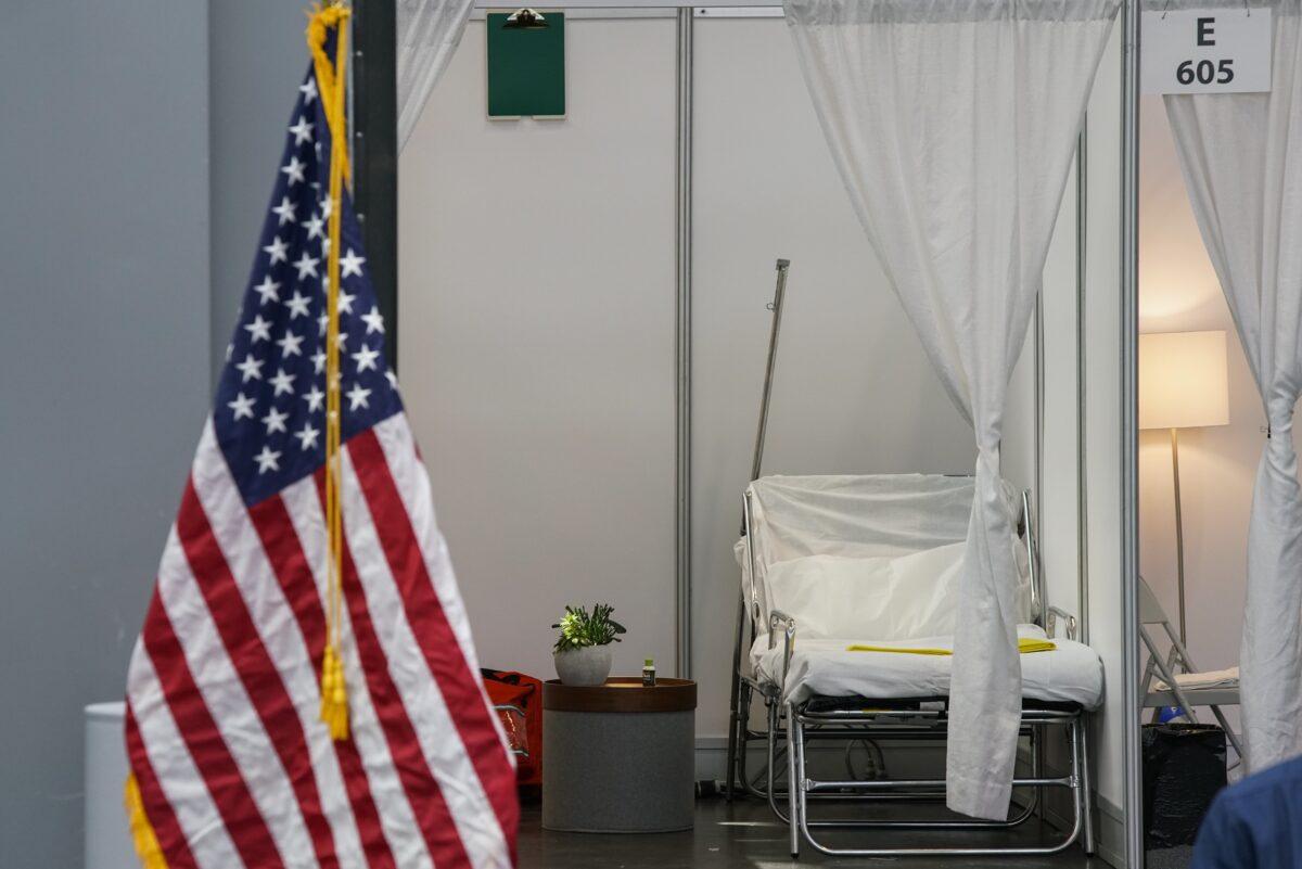 An improvised hospital room is seen during a daily coronavirus press conference by New York Gov. Andrew Cuomo at the Jacob K. Javits Convention Center, which is being turned into a hospital to help fight coronavirus cases, in New York City on March 27, 2020. (åMunoz Alvarez/Getty Images)