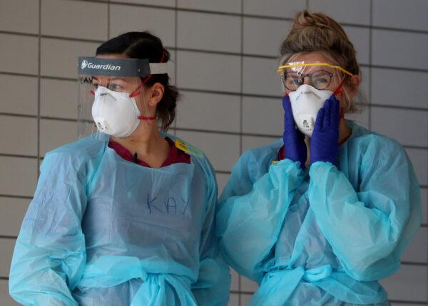 Medical staff wearing protective clothing at St Thomas' hospital as the spread of COVID-19 continues, London, UK, on March 31, 2020. (Hannah McKay/Reuters)