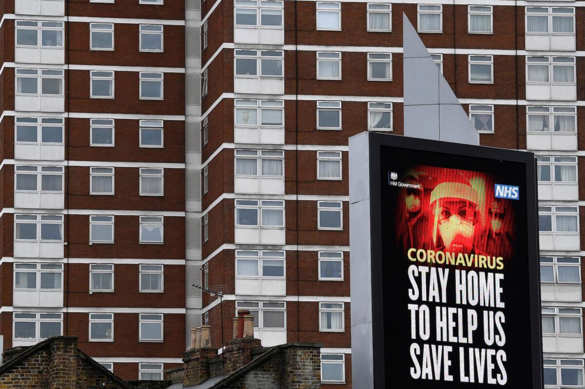 A UK government public health campaign message is displayed on a billboard in West London, as the spread of COVID-19 continues, in London, UK, on April 1, 2020. (Reuters/Toby Melville/File Photo)