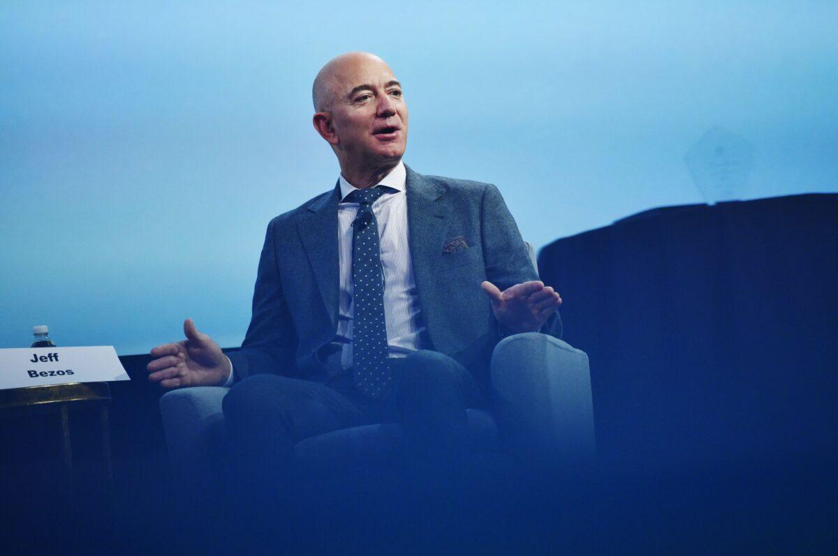 Blue Origin founder Jeff Bezos speaks at the 70th International Astronautical Congress at the Walter E. Washington Convention Center in Washington, on Oct. 22, 2019. He received the 2019 International Astronautical Federation (IAF) Excellence in Industry Award. (Mandel Ngan /AFP/Getty Images)