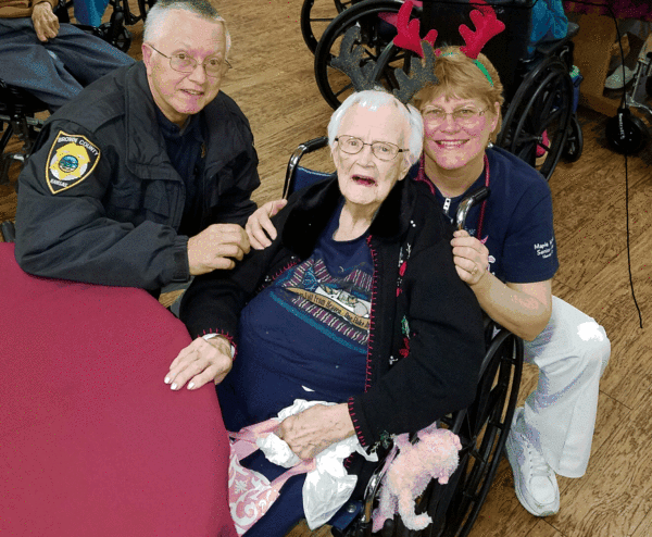 John Merchant with seniors at Maple Heights nursing home in Hiawatha, Kansas, in October 2017. (Courtesy of John Merchant)