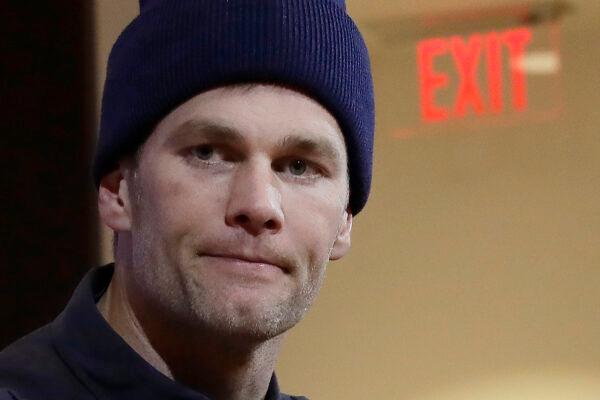 New England Patriots quarterback Tom Brady listens to a question at his post-game news conference in Foxborough, Mass., on Jan. 4, 2020. (Elise Amendola/AP)