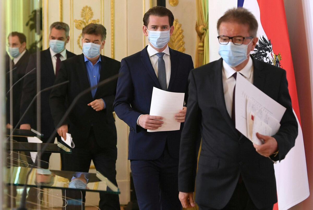 Austrian Health Minister Rudolf Anschober, Chancellor Sebastian Kurz, Vice-Chancellor Werner Kogler and Interior Minister Karl Nehammer arrive for a news conference as the spread of the CCP virus continues, in Vienna on April 6, 2020. (Helmut Fohringer/Pool via Reuters)