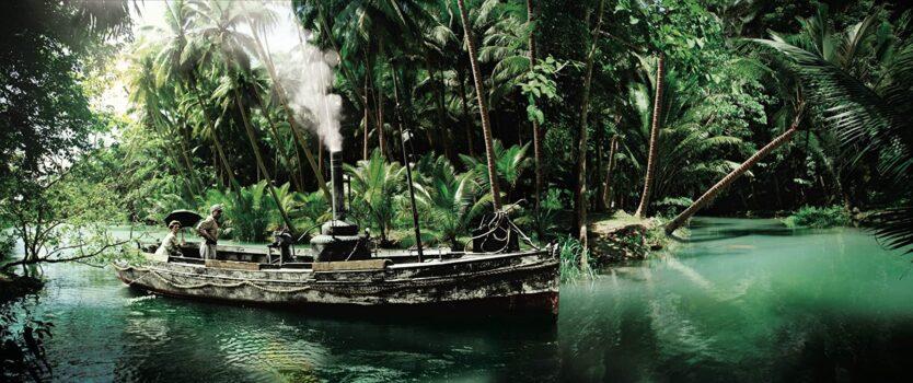 The African Queen sails on location. The film was shot in Uganda and the Belgian Congo. (United Artists)