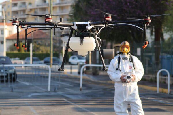 A technician flies a drone that will spray disinfectant along the streets of the French Riviera city of Cannes, southern France, on April 10, 2020. (Valery Hache /AFP via Getty Images)
