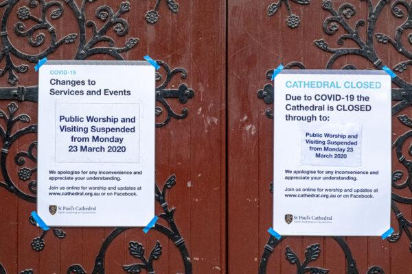 Signs on the main doors of the St Pauls Cathedral advising patrons that the Church is closed, on March 23, 2020. (Asanka Ratnayake/Getty Images)