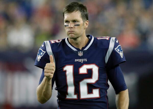 New England Patriots quarterback Tom Brady signals a thumbs-up on the sideline during the second half of a preseason NFL football game against the Philadelphia Eagles in Foxborough, Mass., on Aug. 16, 2018. (Charles Krupa/AP Photo)