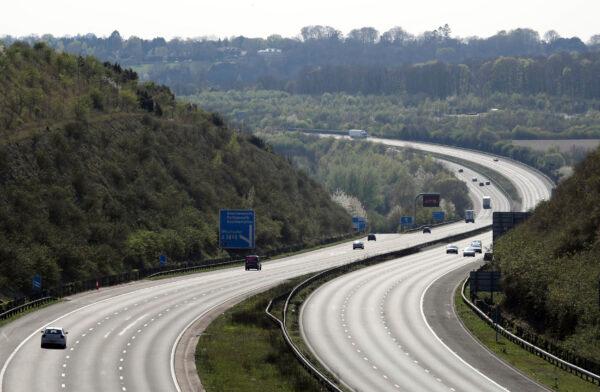 The almost empty M3 motorway, that would normally carry thousands of holidaymakers for this long holiday weekend, near to Winchester, England, on April 10, 2020. (Andrew Matthews/PA via AP)