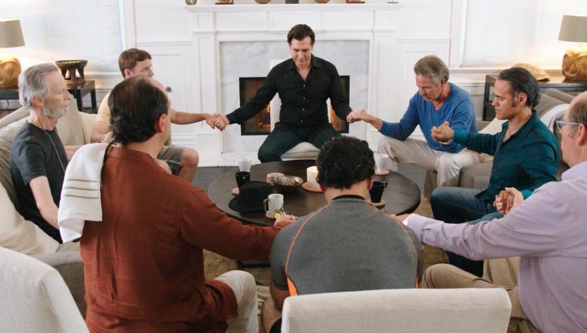 Clockwise from man in black shirt, Joseph Culp (C): Timothy Bottoms, Ali Saam, Stephen Tobolowsky, Terence J. Rotolo, Phil Abrams, David Clennon, and Mackenzie Astin, in “Welcome to the Men’s Group.” (Leomark Studios)