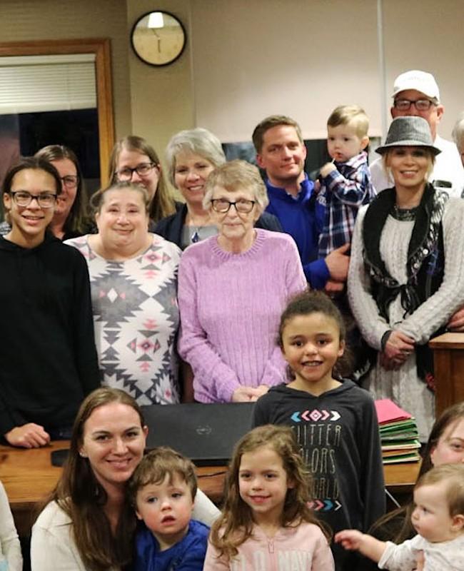 Linda Herring and fostered family members with their children. (Photo courtesy of <a href="https://twitter.com/JohnsonCountyIA">Johnson County, Iowa</a>)