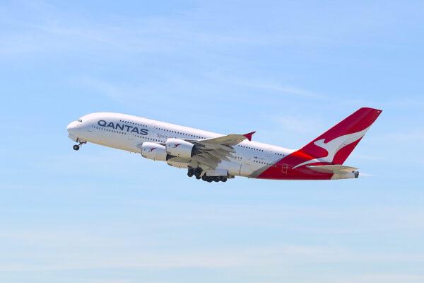 A Qantas aircraft takes off from the international terminal of Sydney Airport on March 19, 2020 in Sydney, Australia. (Mark Metcalfe/Getty Images)