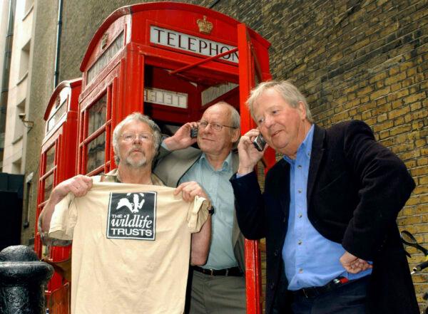 The Goodies—Bill Oddie (L), Graeme Garden (C) and Tim Brooke-Taylor (R)—pose for the media outside The Prince Charles Cinema in Leicester Place, central London on April 24, 2003. (Yui Mok/PA via AP)
