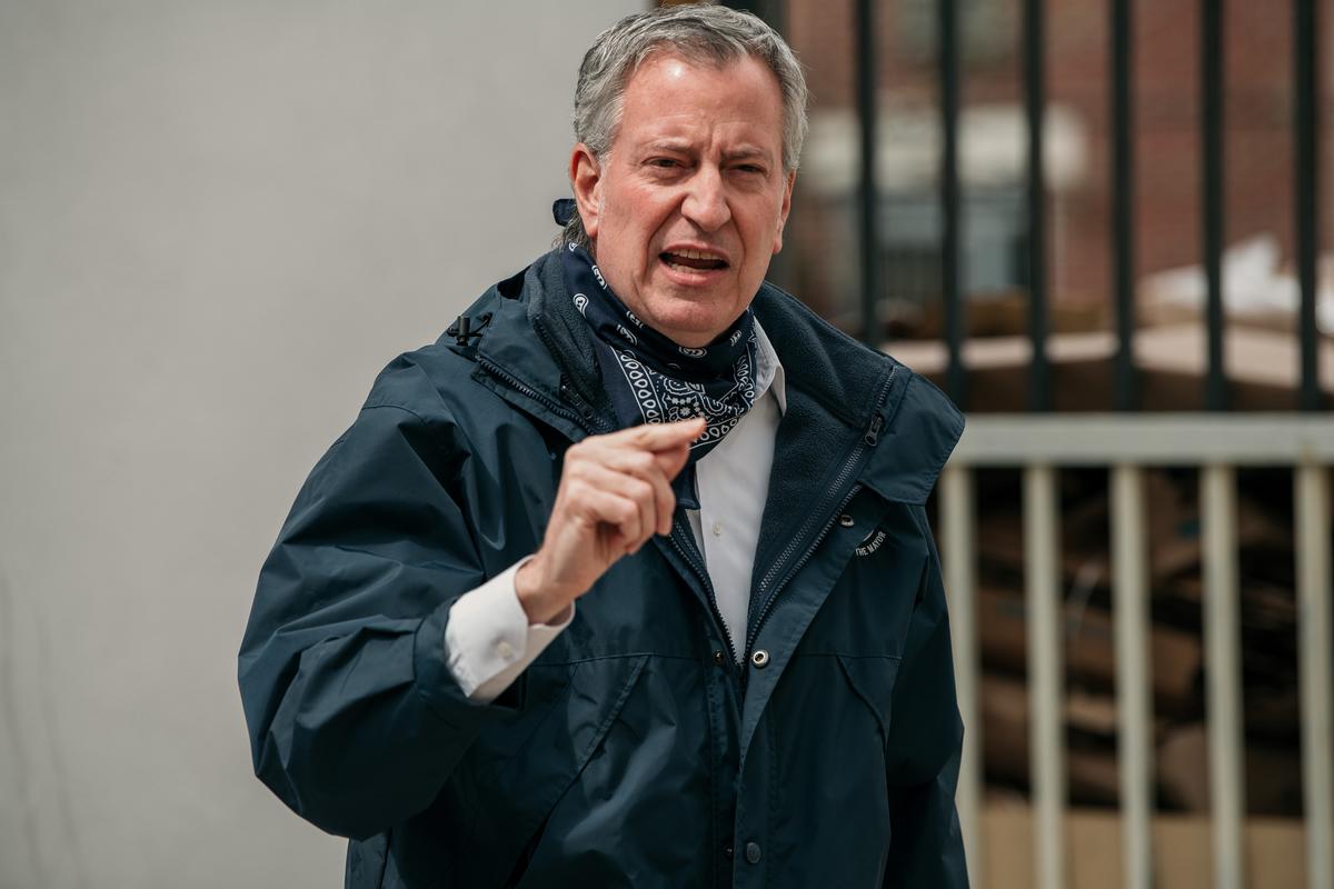 New York City Mayor Bill de Blasio speaks at a food shelf organized by The Campaign Against Hunger in Bedford-Stuyvesant, Brooklyn, on April 14, 2020. (Scott Heins/Getty Images)