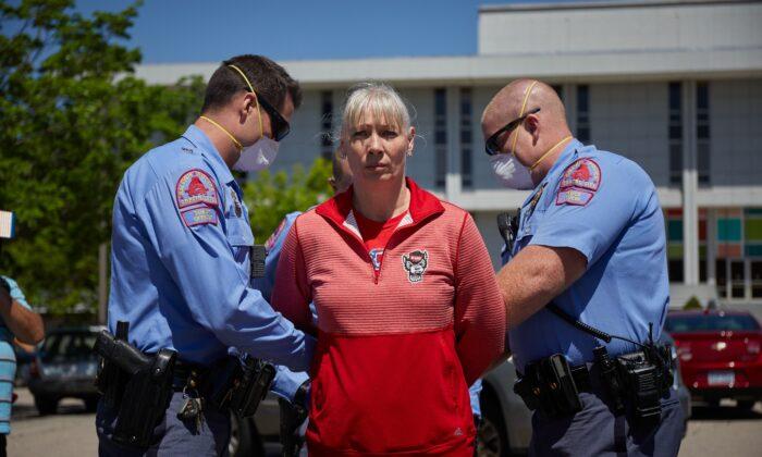 One Arrested As Protesters Rally for North Carolina to Reopen Despite Stay-At-Home Order