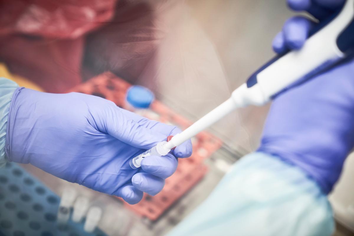 A Malian researcher conducts a coronavirus test at the University Clinical Research Center of Bamako, Mali, on March 19, 2020. (MICHELE CATTANI/AFP via Getty Images)