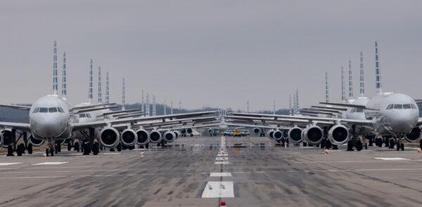 Jets are parked on runway 28 at the Pittsburgh International Airport in Pittsburgh, Pa., on March 27, 2020. (Jeff Swensen/Getty Images)