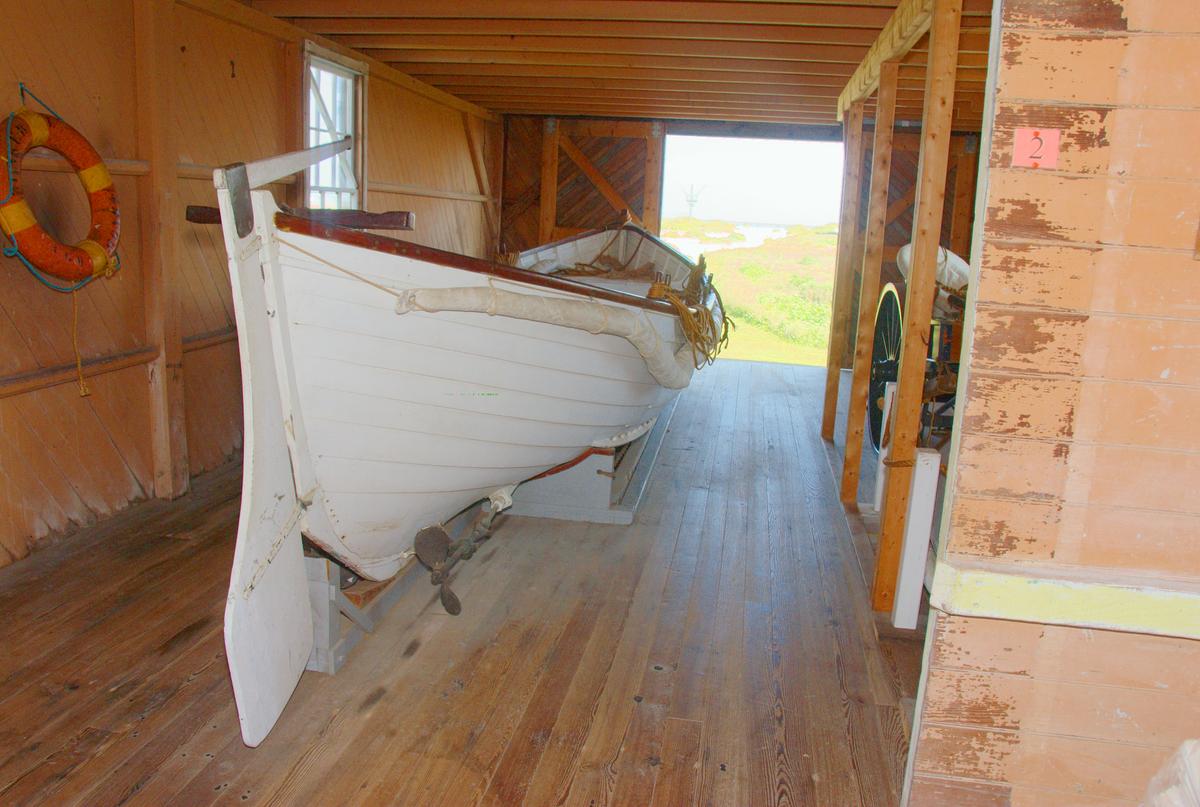 A rescue boat on display at the Chicamacomico Life-Saving Station on Pea Island. More than 1,500 known shipwrecks lie off the North Carolina coast. (Copyright Fred J. Eckert)