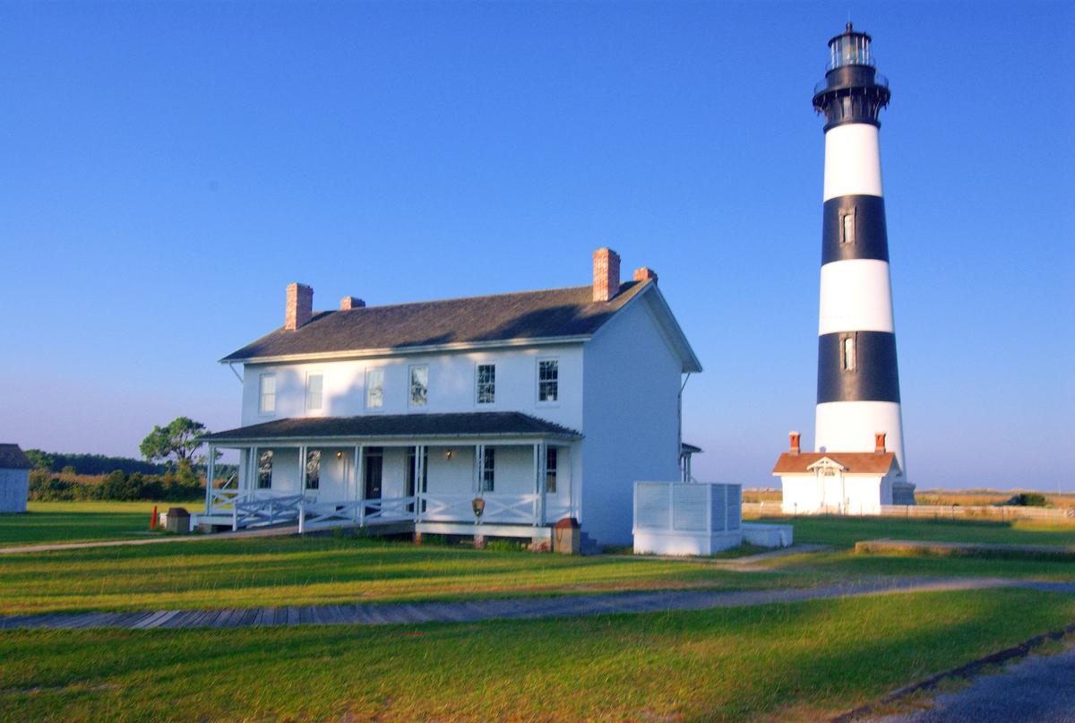 Bodie Island Lighthouse rises 165 feet and was put here to illuminate the perilous stretch of coast between Cape Hatteras and Currituck Beach. (Copyright Fred J. Eckert)