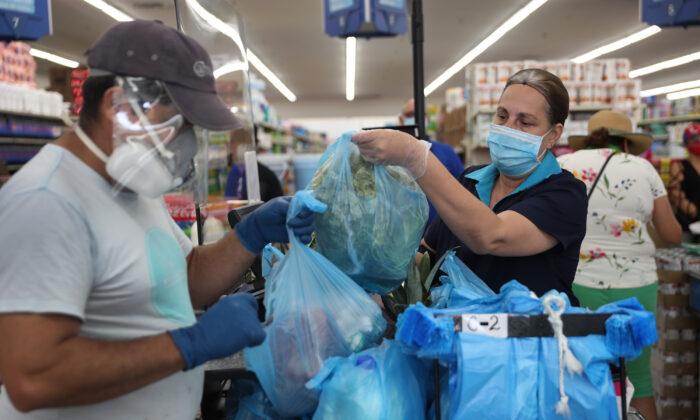 Walmart Requires Workers to Wear Face Masks at Work