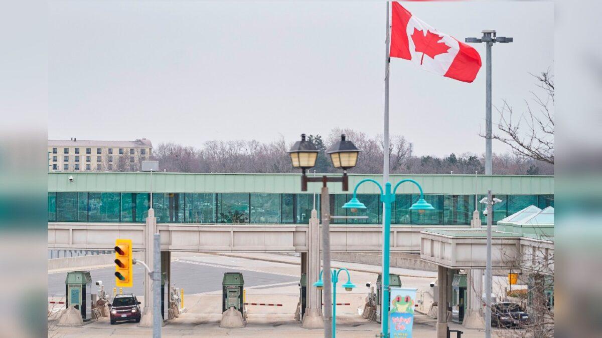 Hours after Canadian Prime Minister Justin Trudeau announced the closing of the border with the United States to all tourists, a car stops at a Canadian customs booth in Niagara Falls, Canada, on March 18, 2020. (Geoff Robins/AFP via Getty Images)