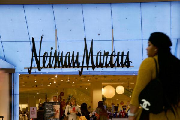 Shoppers enter and exit the Neiman Marcus at the King of Prussia Mall in King of Prussia, Pennsylvania, on Dec. 8, 2018. (Mark Makela/Reuters)