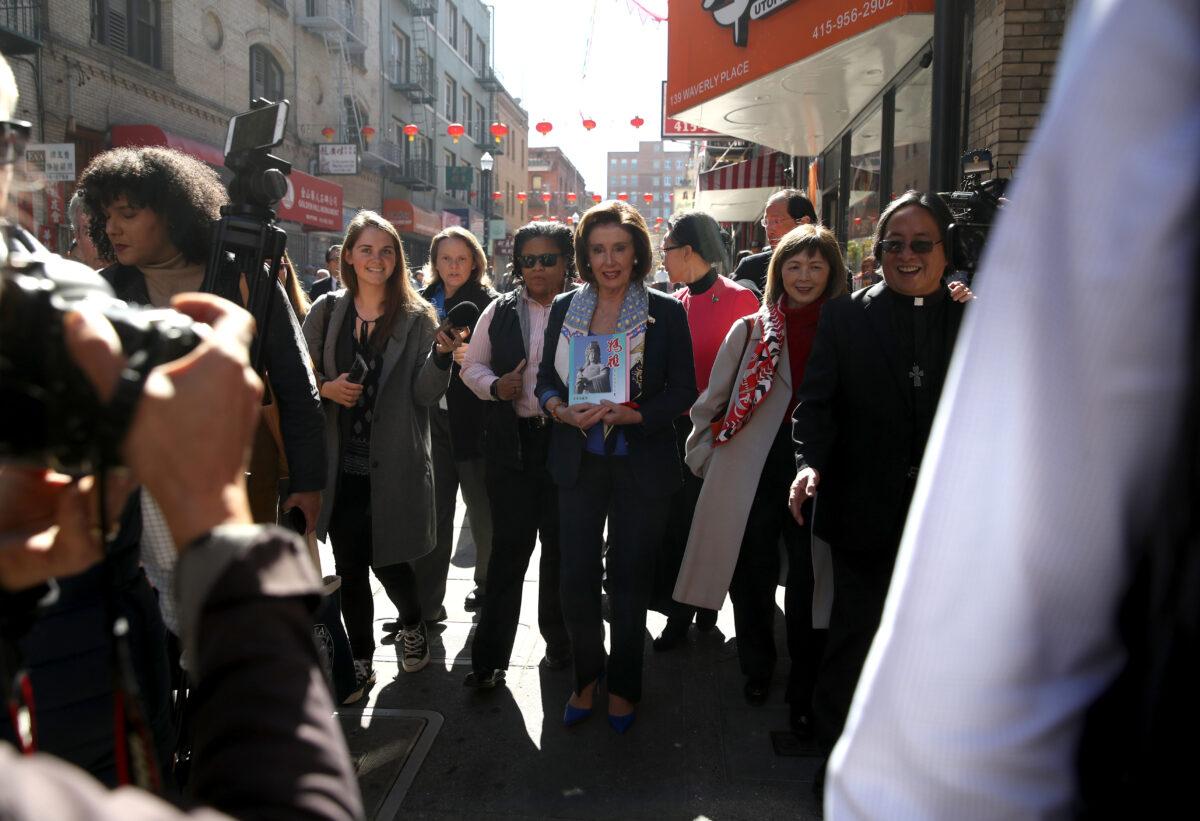 House Speaker Nancy Pelosi (C) (D-Calif.) tours San Francisco's Chinatown on February 24, 2020. (Justin Sullivan/Getty Images)